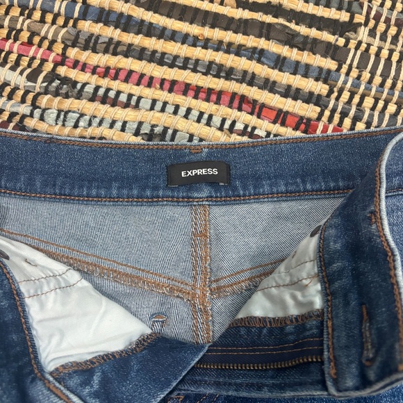 Dark wash small flared jeans with tiny slits on the bottom||Express - Picture 4 of 4